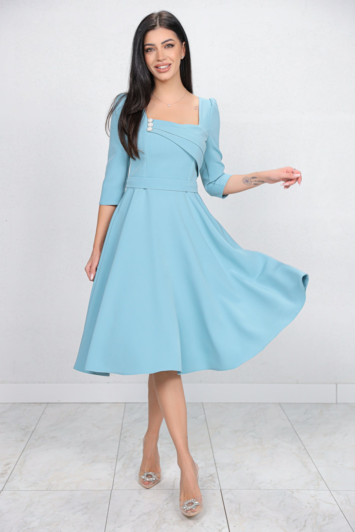 Rochie MBG bleu cu design in zona bustului accesorizat cu nasturi perlute