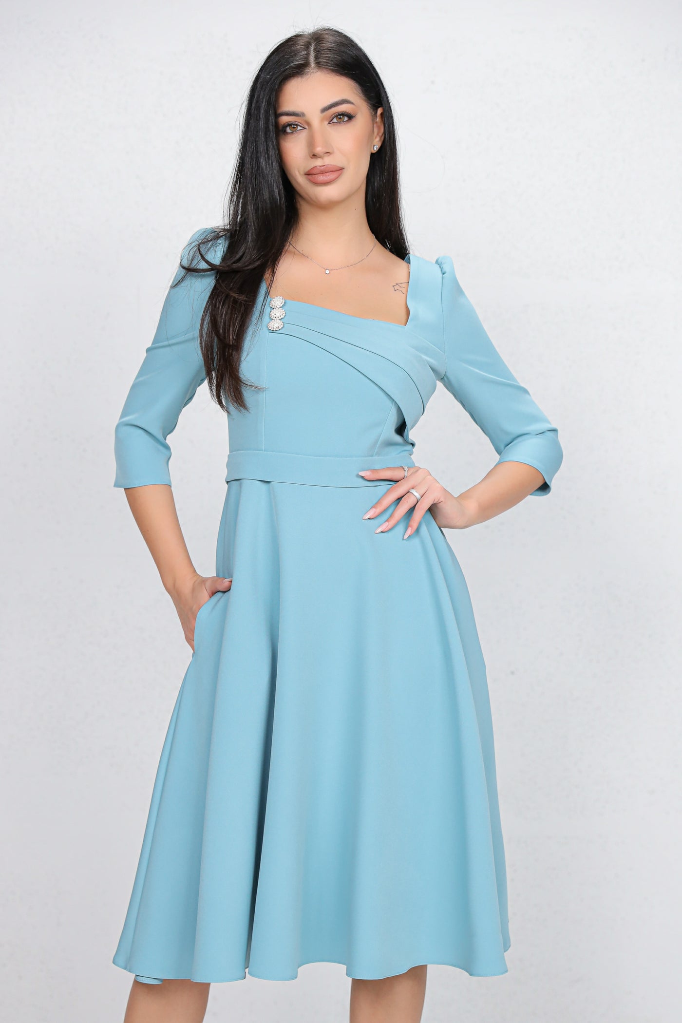 Rochie MBG bleu cu design in zona bustului accesorizat cu nasturi perlute